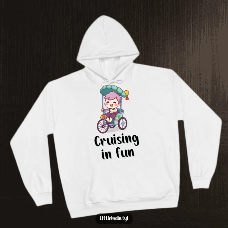 Funny hoodie showing a character with a mischievous grin, riding a decorated rickshaw with a playful, adventurous attitude.