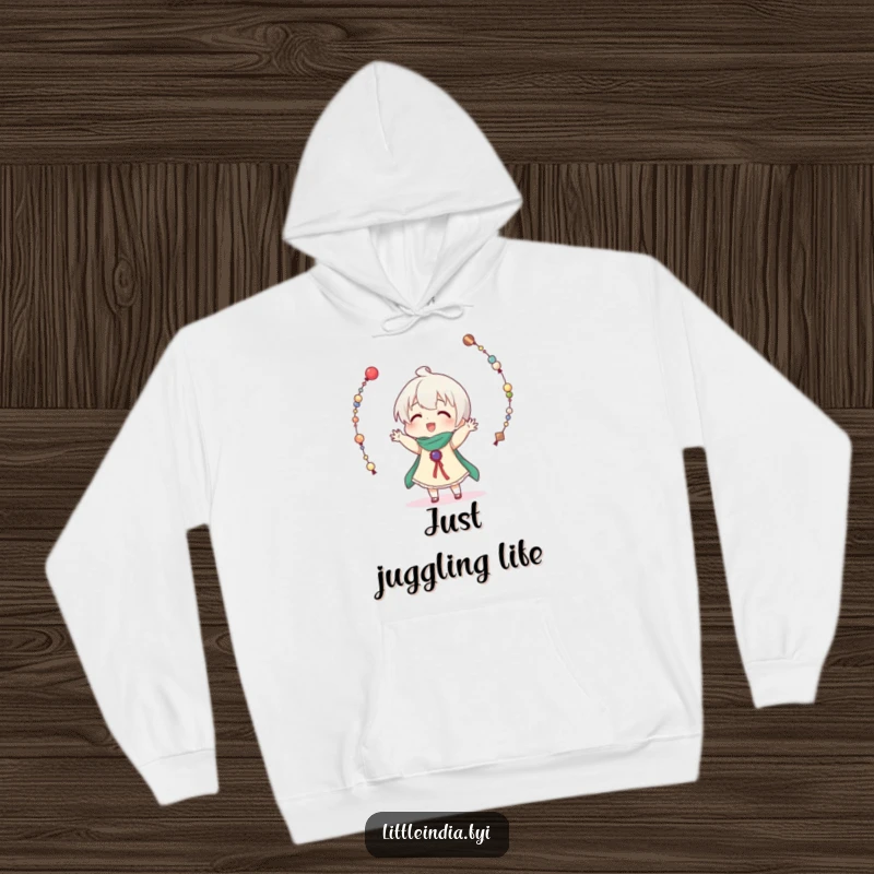 Funny hoodie depicting a character comically trying to juggle numerous decorative bead strings, dropping them in a humorous display.