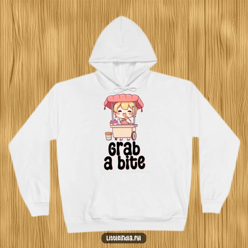 Funny hoodie featuring a delighted street vendor character offering a treat, offering cozy comfort and a warm sense of radiating happiness.